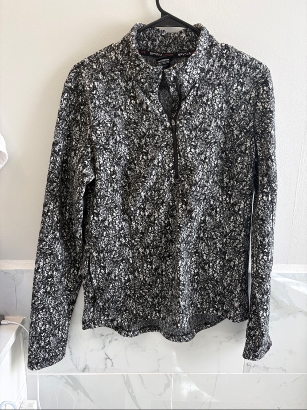 Spyder Women's Black and Gray Marled Quarter-Zip Pullover